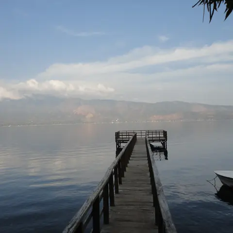 Dock extending into Lake Coatepeque