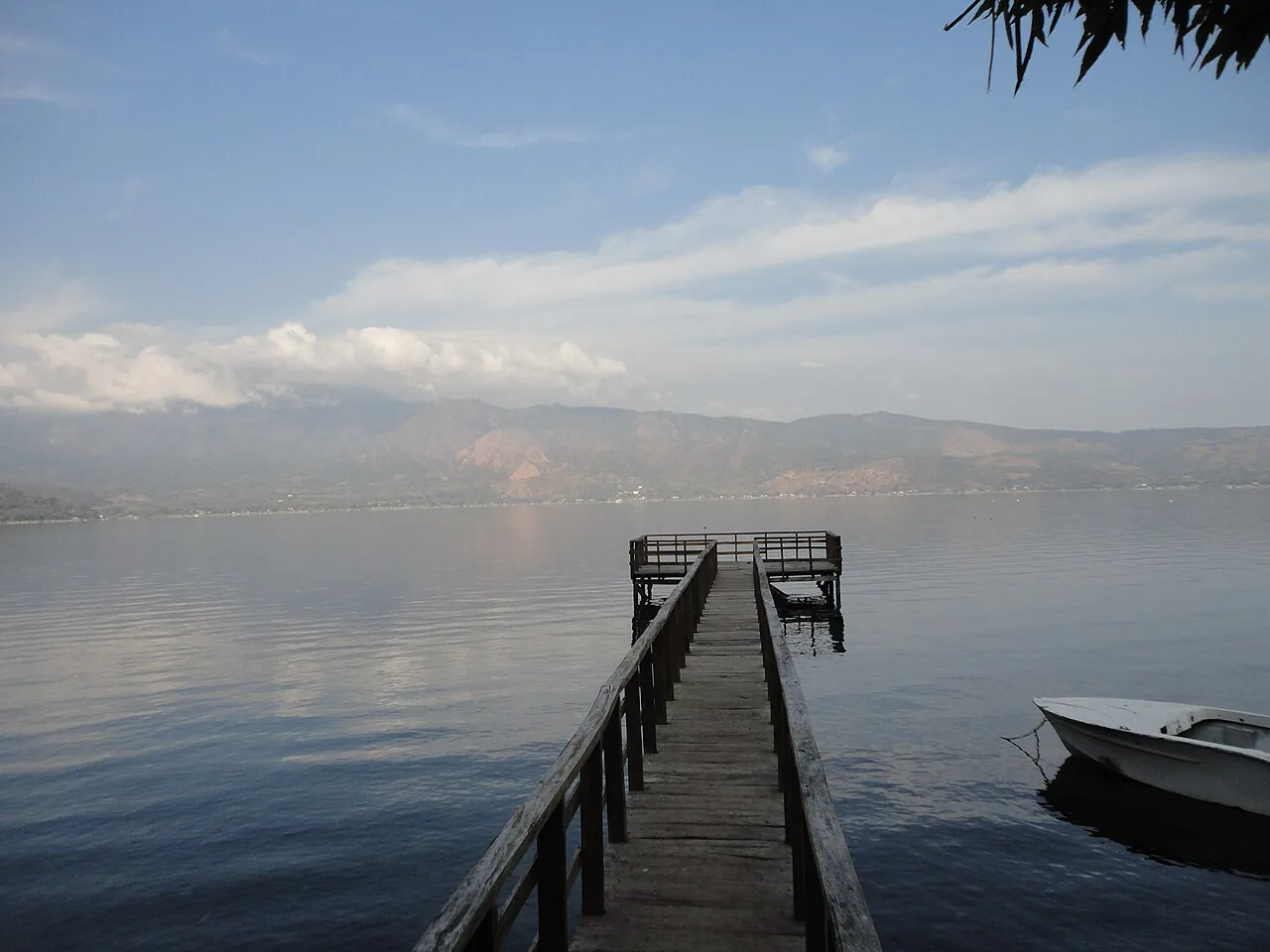 Dock extending into Lake Coatepeque