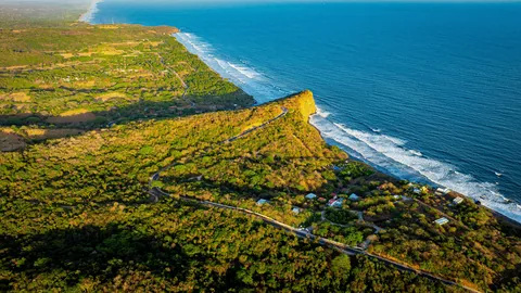 Aerial view of Punta Mango's green headland and Pacific coast