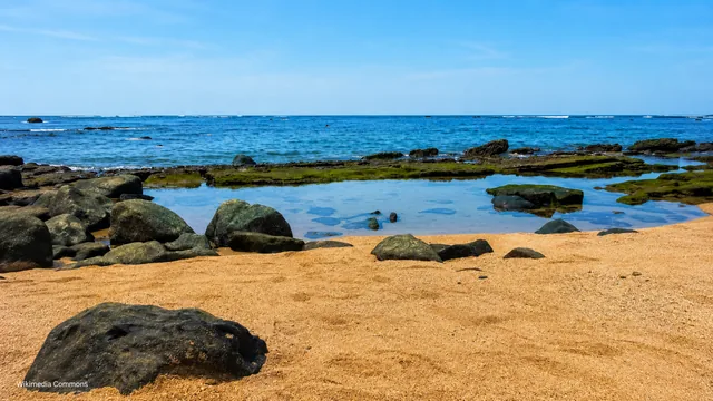 Los Cóbanos beach, shown in an owner-approved photograph from El Salvador